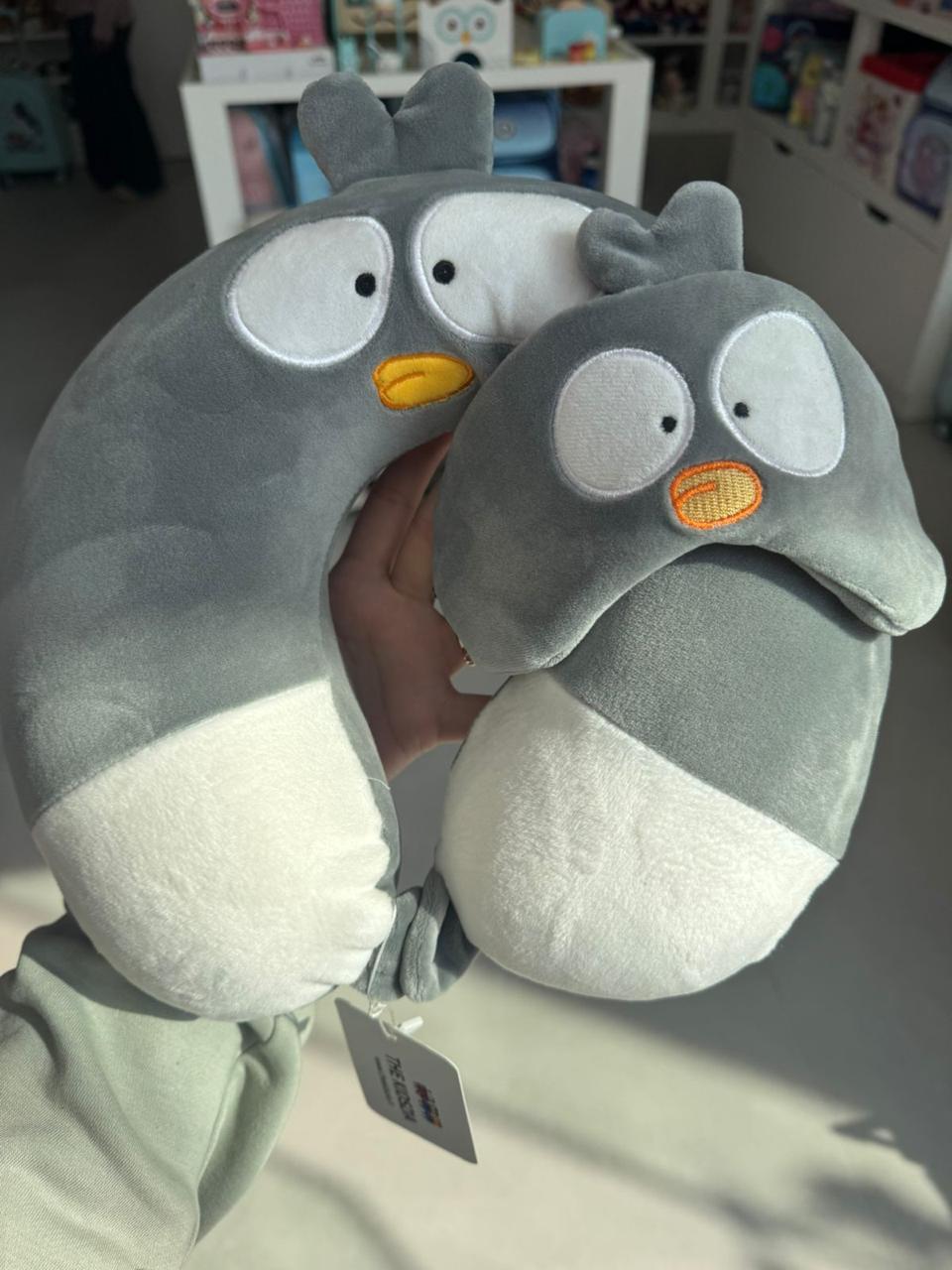 Grey neck pillow with eye mask