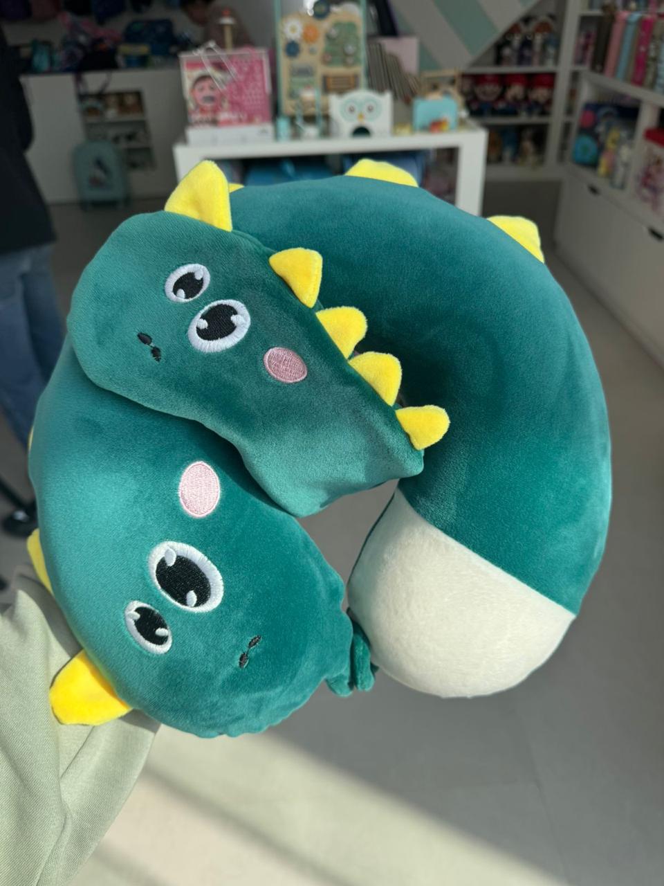 Green neck pillow with eye mask